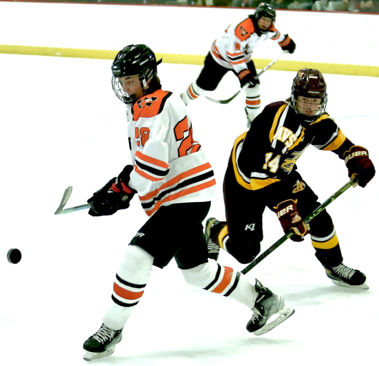 David Hoherty tries to control the loose puck